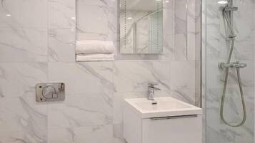 Regadera y secadora de cabello