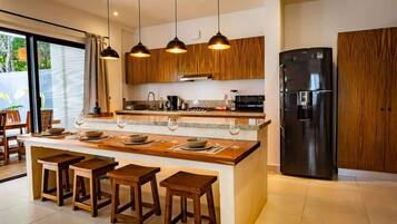 Fridge, microwave, coffee/tea maker, high chair