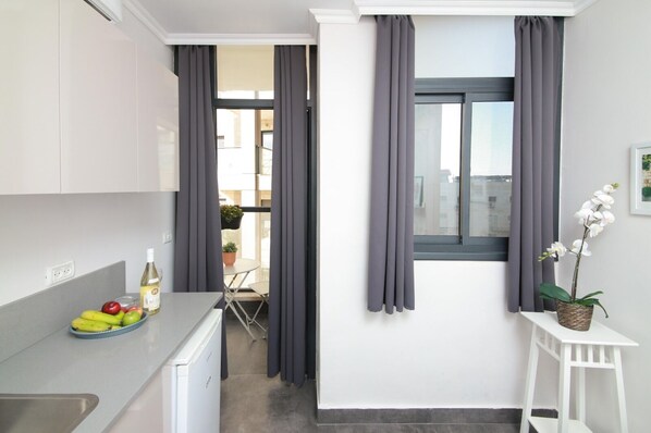 Blackout drapes, soundproofing, iron/ironing board, free WiFi