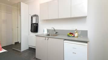 Rideaux occultants, chambres insonorisées, fer et planche à repasser