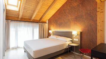 Superior Double Room, Private Bathroom | In-room safe, desk, laptop workspace, blackout drapes