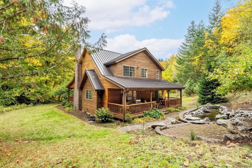 Custom Crafted Forest Retreat with Pond on 5 Acres
