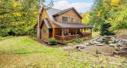 Custom Crafted Forest Retreat with Pond on 5 Acres