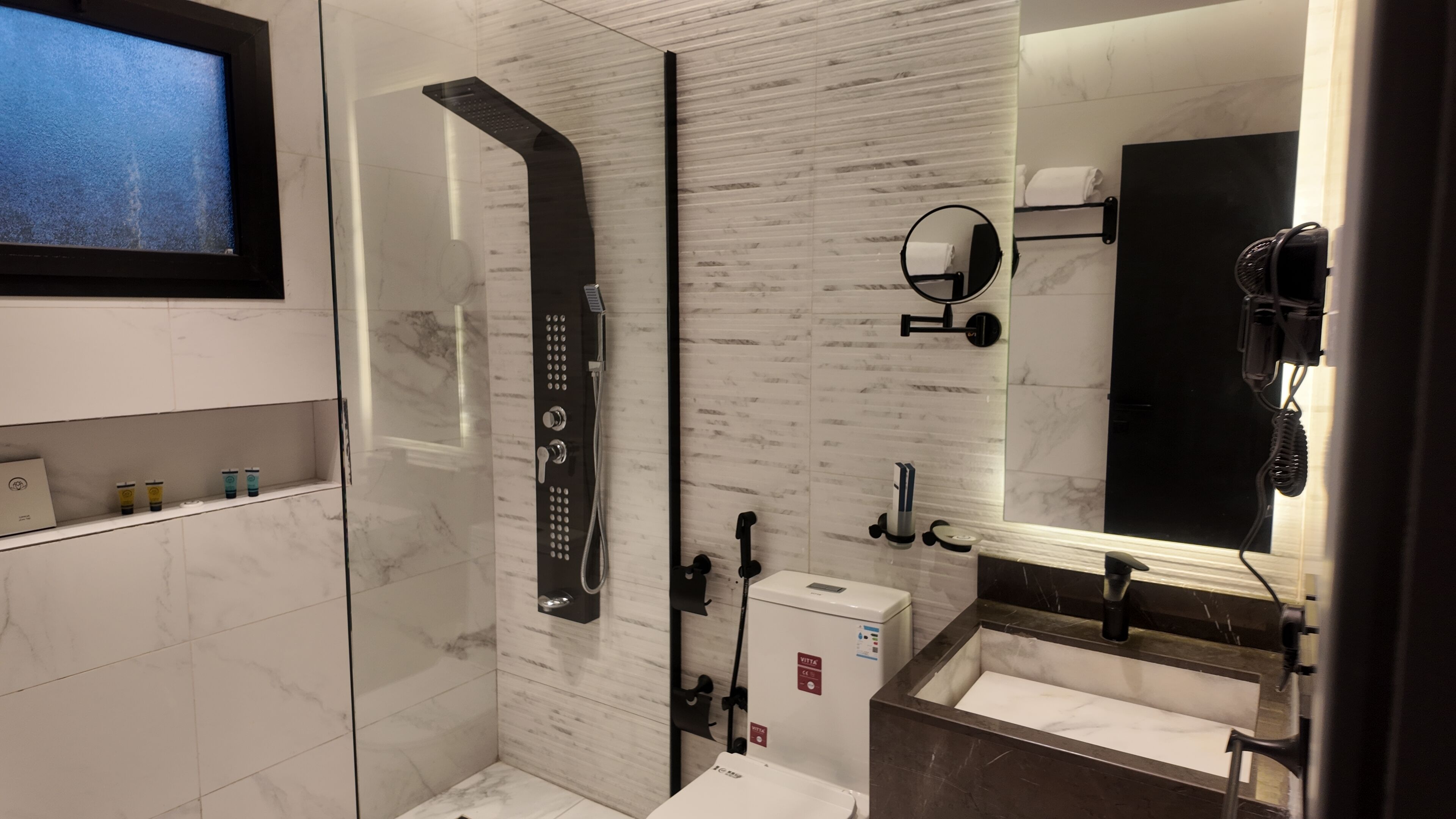 Free toiletries, hair dryer, bidet, towels