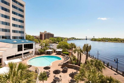 Along Wilmington Riverwalk + On-site Dining & Pool