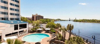 Along Wilmington Riverwalk + On-site Dining & Pool