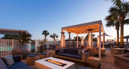 Along Wilmington Riverwalk + On-site Dining & Pool