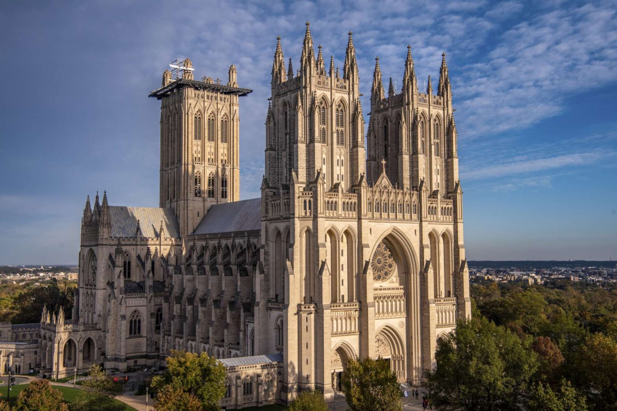 A large Gothic cathedral with multiple spires and a prominent central tower.