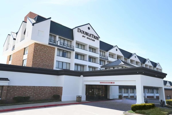 Front entrance of DoubleTree by Hilton on a sunny day