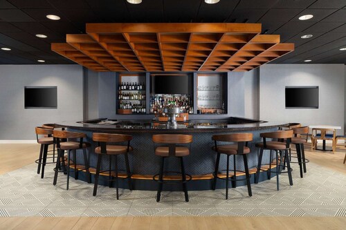 Minutes to Pimlico Race Course + Dining & Fitness