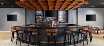 Minutes to Pimlico Race Course + Dining & Fitness