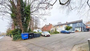 A residential street with parked cars and houses. - 58A Thorpe Road, Norwich (Norwich)