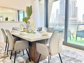 Dining - 3 bdr Chic Apt with Burj Khalifa & Fountain views! (Dubai)