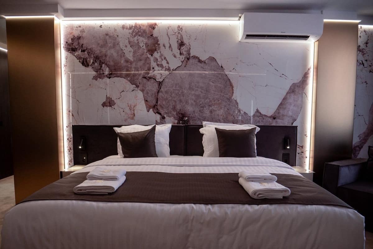 Exclusive Studio, Multiple Beds, City View | In-room safe, desk, laptop workspace, blackout drapes