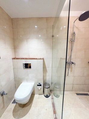 Shower, towels, soap, shampoo