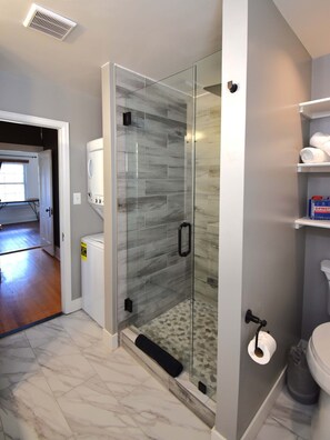 Shower, hair dryer, towels