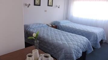 Basic Triple Room | In-room safe, free WiFi