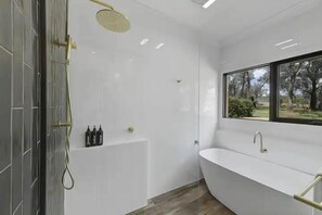 Shower, hair dryer, towels, shampoo