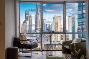 Family Suite, 3 Bedrooms, Non Smoking, City View | Living area