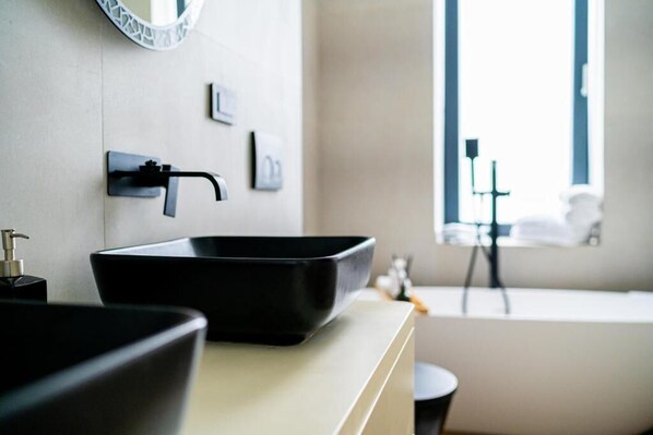 Hair dryer, towels, soap, toilet paper