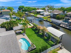 Outdoor pool, a heated pool - The Waterfront Family Oasis- Pool, Dock & Relaxing Backyard (Ellenton)