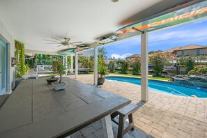 Outdoor pool, a heated pool - The Waterfront Family Oasis- Pool, Dock & Relaxing Backyard (Ellenton)