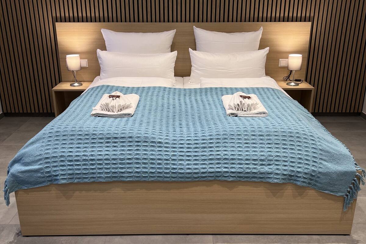 Deluxe Double Room, Private Bathroom | Desk, laptop workspace, blackout drapes, soundproofing