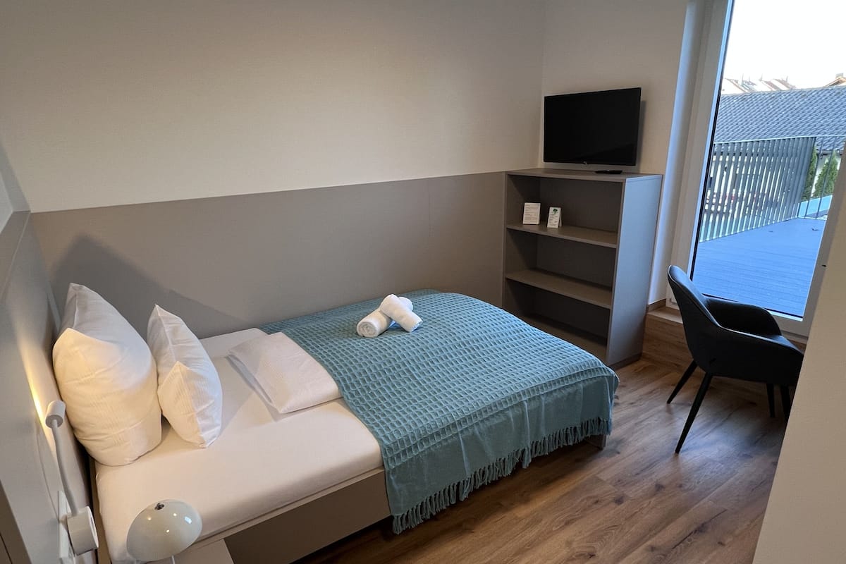 Laptop workspace, blackout drapes, soundproofing, iron/ironing board