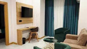 Literie de qualité supérieure, minibar, fer et planche à repasser