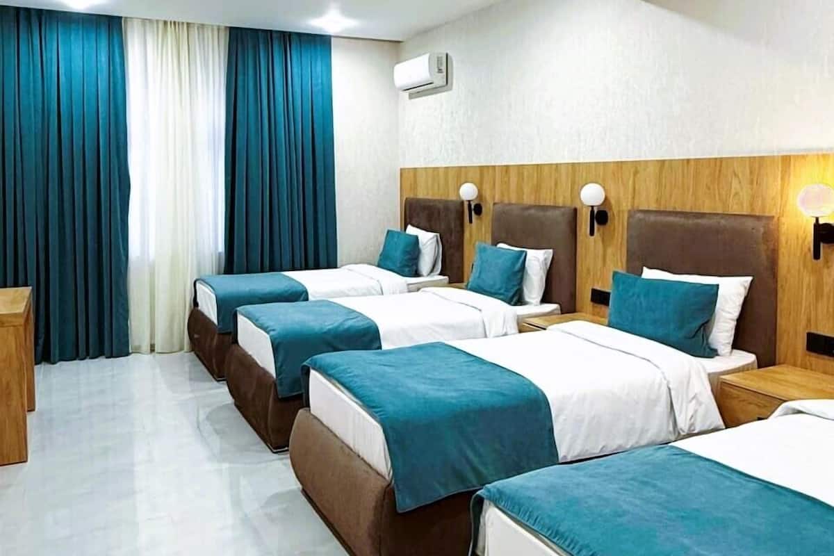 Habitación cuádruple | Tabla de planchar con plancha y wifi gratis