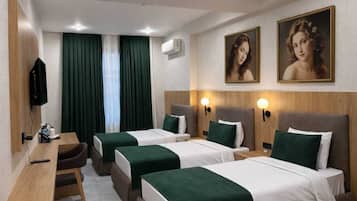 Triple Room | Premium bedding, minibar, iron/ironing board, free WiFi