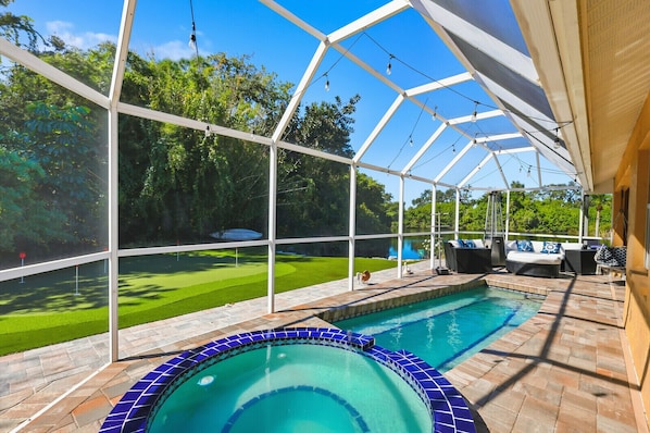 Outdoor pool, a heated pool - Luxury 3-Bed Poolside Oasis w/ Spa & Putting Green (Sarasota)