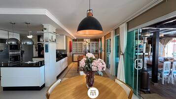 Honeymoon House, Pool Access, Beach View | Living area | 42-inch Smart TV with digital channels, Netflix, pay movies