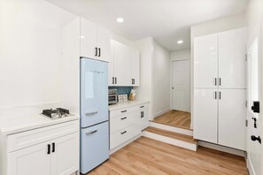 Fridge, stovetop, coffee/tea maker, toaster