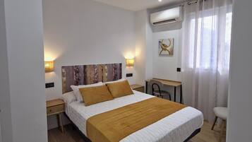 Apartment, 1 Bedroom | Premium bedding, down comforters, desk, laptop workspace