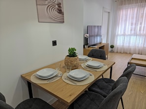 Apartment, 1 Bedroom | Living area | 32-inch Smart TV with digital channels - Apartamentos Picasso by gaiarooms (Salamanca)