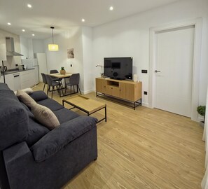 Apartment, 1 Bedroom | Living area | 32-inch Smart TV with digital channels - Apartamentos Picasso by gaiarooms (Salamanca)