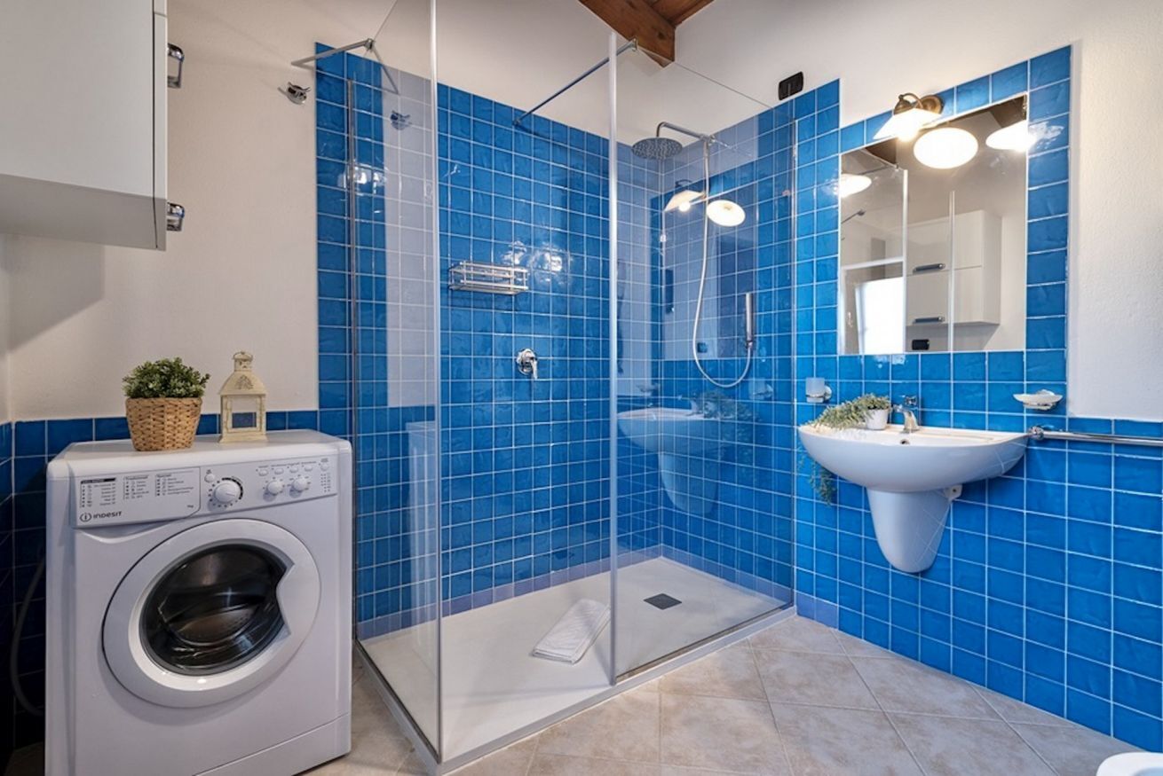 Ducha, bidet, toallas