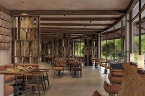 A spacious restaurant with high ceilings and natural light from large windows. Tables are arranged for dining, and there are chairs and tables visible. - Namia River Retreat - Wellness Inclusive Resort (Hoi An)