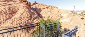 Private residential vacation home nestled in the native Navajo Sandstone rocks of Sand Hollow enjoy this one of a kind experiences.  4 Br, 3 bath rental that sleeps 10 with ease - themed and ready to enjoy!