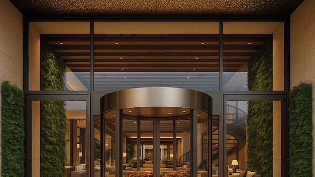 Een modern interieur met een draaiende deur in het midden, glazen wanden en een trap naar een hoger niveau.