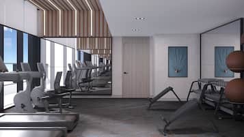 A modern gym with exercise equipment, large windows, and a patterned carpet.