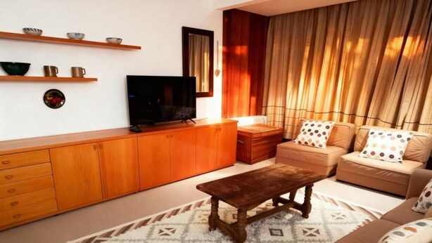 Family Apartment, Multiple Beds, Refrigerator | Living area - Estudio Montblanc (Sierra Nevada)