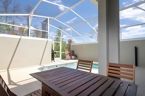 Outdoor dining - Champions Gate 5BR Villa w/ Pool & Star Wars Room (Davenport)