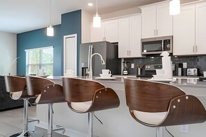 Fridge, microwave, oven, dishwasher - Champions Gate 5BR Villa w/ Pool & Star Wars Room (Davenport)