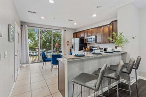 Fridge, microwave, oven, dishwasher - Modern 3BR Condo with Balcony at Vista Cay (Orlando)