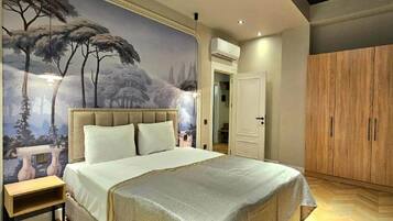 Comfort Apartment, Balcony, City View | In-room safe, desk, laptop workspace, blackout curtains