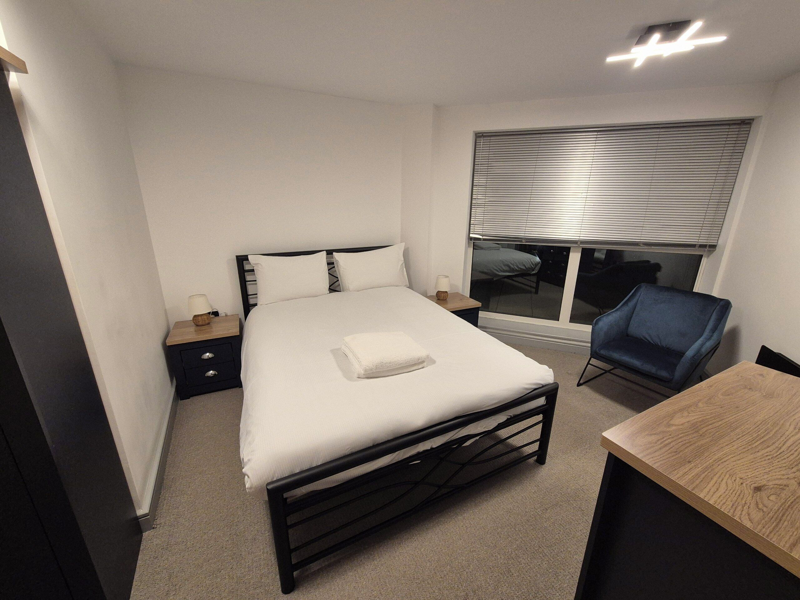 1 bedroom, desk, iron/ironing board, travel cot
