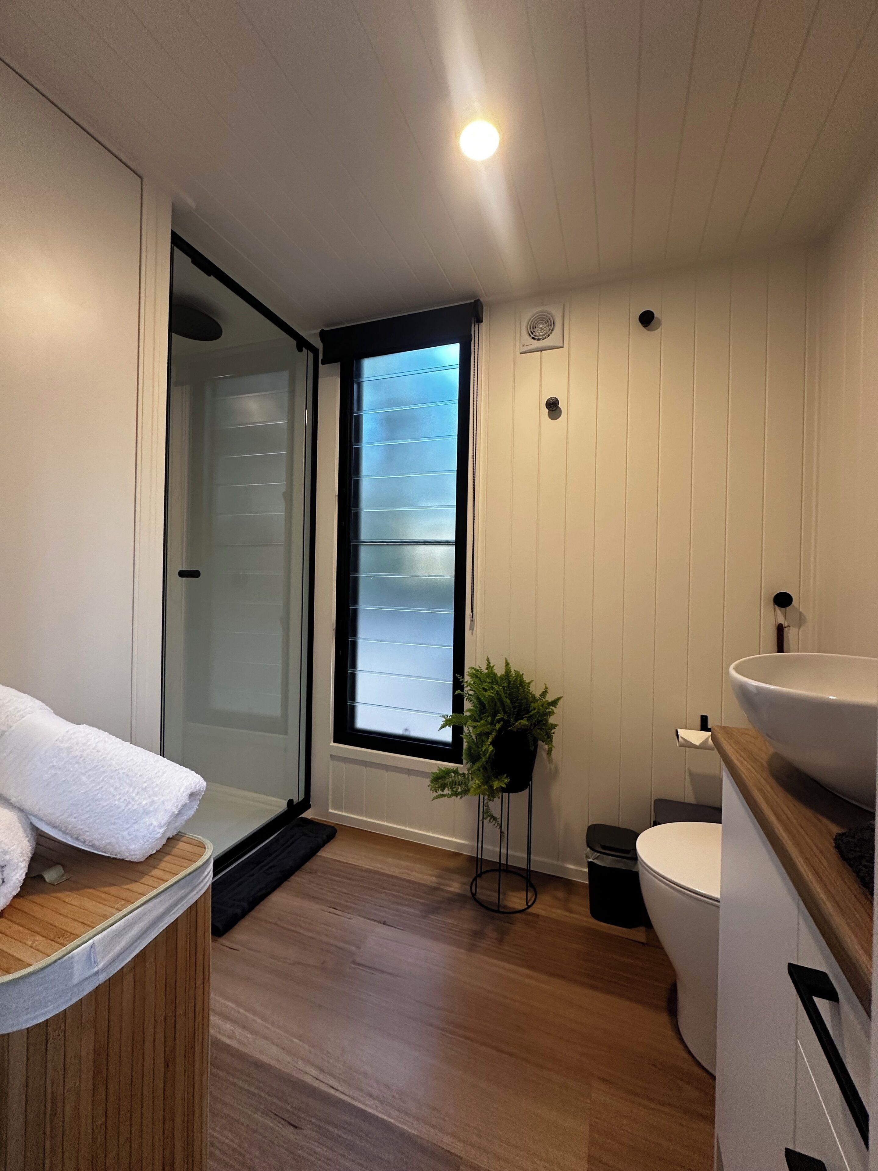 Shower, eco-friendly toiletries, hair dryer, towels