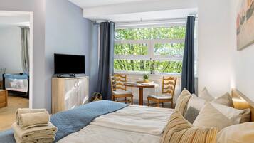 2 habitaciones, tabla de planchar con plancha, wifi y ropa de cama